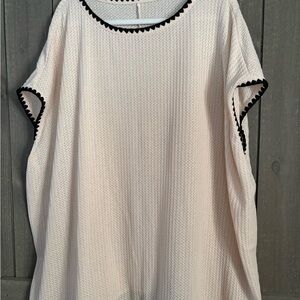 Elegant Cream Women's Top with Black Trim